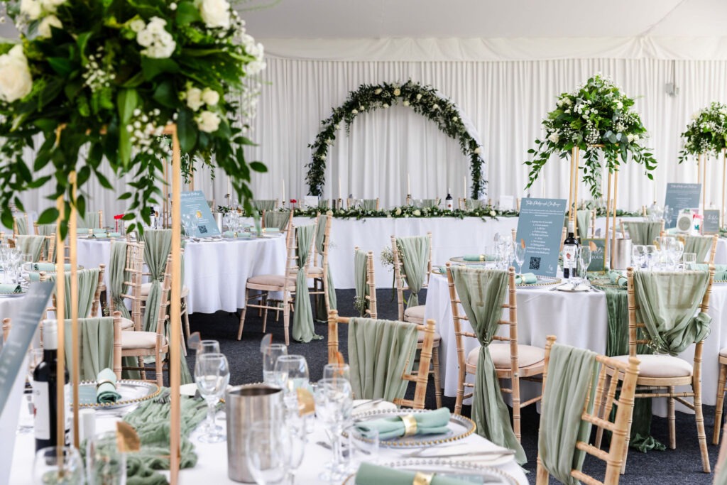 Green and blue decorated hall for wedding, wedding open day fayre