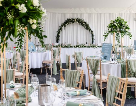 Green and blue decorated hall for wedding, wedding open day fayre